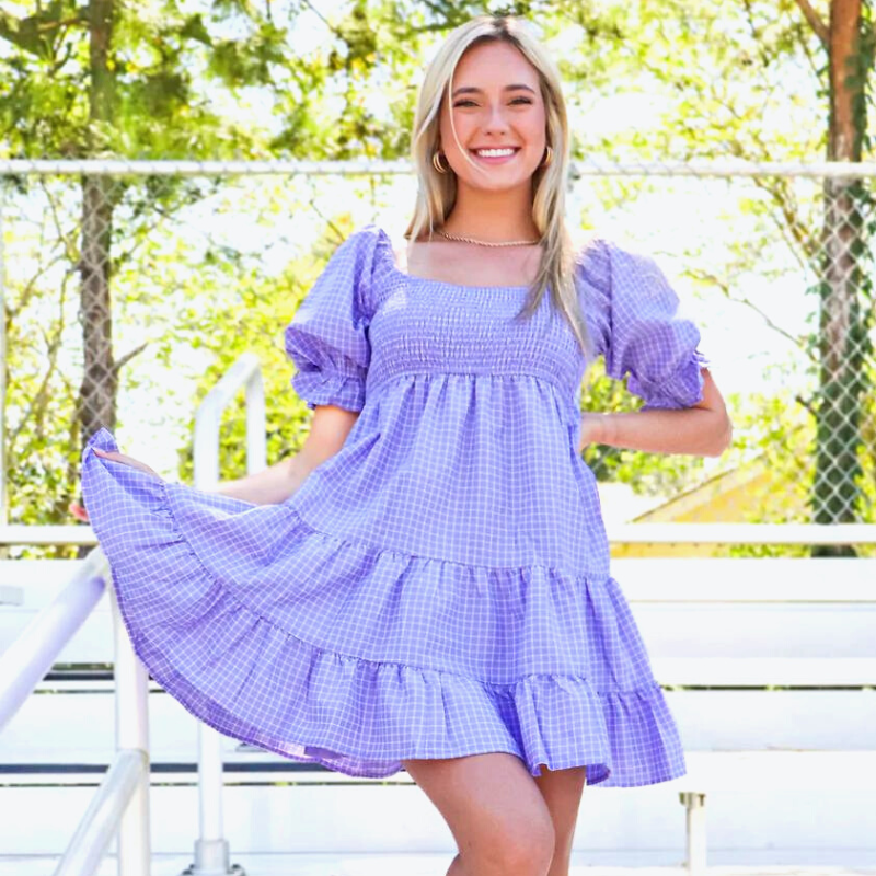 lavender baby doll dress with puff sleeves. purple outfit ideas for lsu game