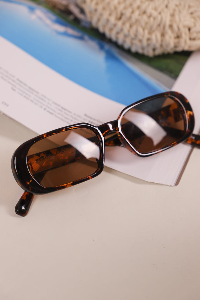 tortoise oval sunglasses 